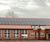Clay and solar PV tiles for sustainable roof renovation at school 1
