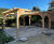 Timber garden room and pergola with green roofs 11