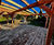 Timber garden room and pergola with green roofs 13