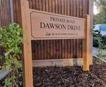 Woodsman badging sign - engraved oak outdoor signage