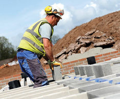 Precast concrete beam and block flooring system