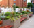 Large bespoke illuminated steel planter / benches for office courtyard 1