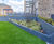 Steel planters and hardwood seating for new residential development 5