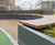 Steel planters and hardwood seating for new residential development 2