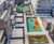 Steel planters and hardwood seating for new residential development 3