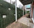 Construction anchors secure failing timber crib retaining wall 4