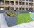 Steel planters and hardwood seating for new residential development 11