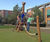 Greg climbing giraffe - robinia wood playground climbing structure 1