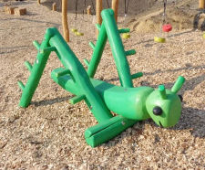 Grilli grasshopper play unit - green robinia wood carved animal play figure