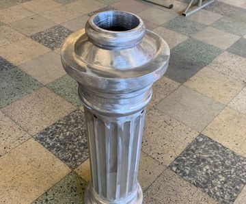 Cast metal bases for architectural columns