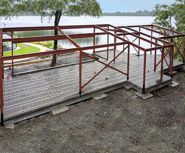 FP McCann supplies beam & block flooring for lakeside cabin at Lough Erne