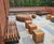 Timber seating and steel planters for Queen’s Business School, Belfast 0