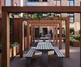 Timber pergolas, planters, picnic sets and seats for mixed-use development - on this page