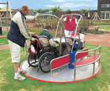 Integration Carousel - stainless steel wheelchair accessible roundabout - on this page