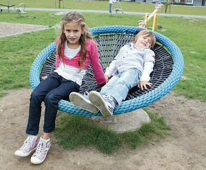 Satellite Carousel - steel playground spinner for reclining or turning