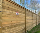 Timber industrial noise barrier and gate for wood shavings manufacturer - on this page