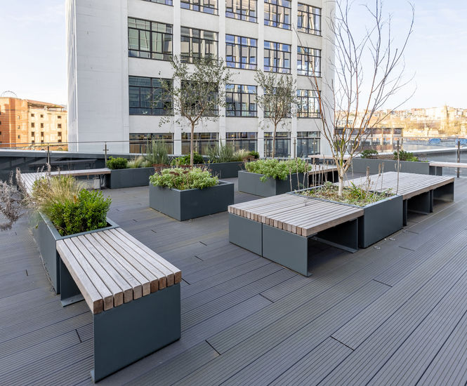 Bespoke planters with integrated bench tops elevate terraces at The Fairfax