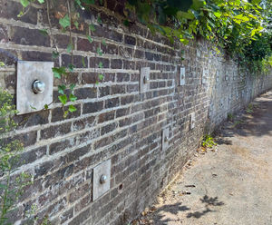 Percussion Driven Earth Anchors stabilise damaged retaining wall - Redhill
