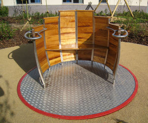 Timber Barrel Roundabout - wheelchair accessible wooden playground spinner