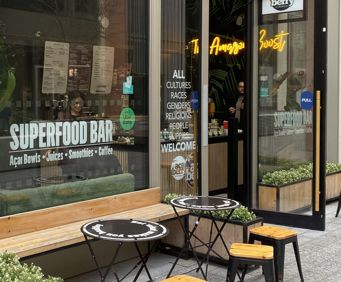 Invisible swing door automation provides seamless access to London café