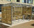 Linear - timber and steel cycle shelter with polycarbonate roof 4