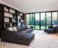 Hockney corner sofa unit with wooden plinth