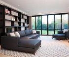 Hockney corner sofa unit with wooden plinth