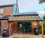 Timber entrance canopy with glazed green roof for residential home