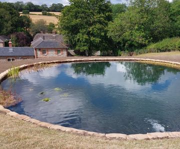SoluForm prefilled concrete bagwork for natural pool construction