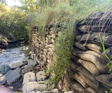 Concrete-filled bagwork addresses riverbank erosion from continuous scour