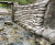 Pre-filled concrete bagwork repairs stream embankment - Dundee 2