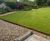 ProEdge corten steel lawn edging creates definition in countryside garden 1