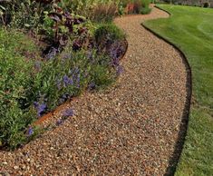ProEdge corten steel lawn edging creates definition in countryside garden