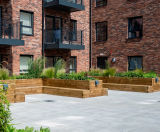 Raised timber planters with integrated seating for residential development - on this page