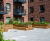 Raised timber planters with integrated seating for residential development 0