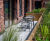 Raised timber planters with integrated seating for residential development 2