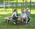 Sofiero 360° Curved Bench - bark brown wood park bench / tree seating 0
