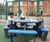 Calder - round recycled plastic 8-seater picnic table with benches 6