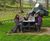 Calder - round recycled plastic 8-seater picnic table with benches 4