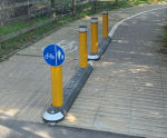 Milestone Island - recycled rubber traffic island for easy surface mounting