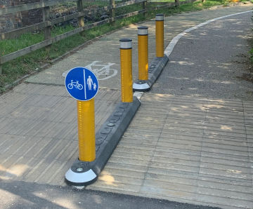 Milestone Island - recycled rubber traffic island for easy surface mounting