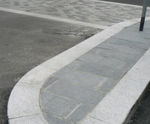 Silver grey granite radius kerbs