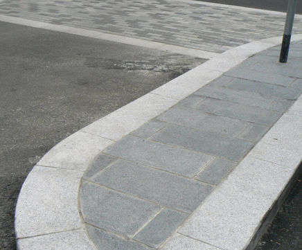 Silver grey granite radius kerbs