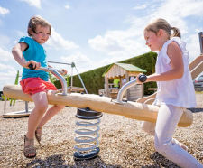 Log Duo Springer - wooden two-seat spring rocker for playgrounds