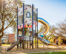 Octagonal Tower - large wood play structure with slides and climbing
