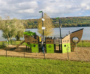 Neptune - large steel boat playground with slides and climbing features