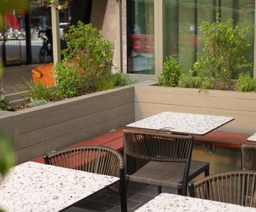 Custom steel planters with hardwood seating