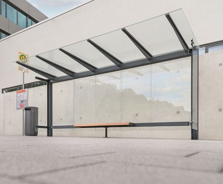 Stingray - glass and steel modular bus shelter with seating