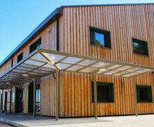 Bespoke wrap-around entrance canopy for new seed processing centre