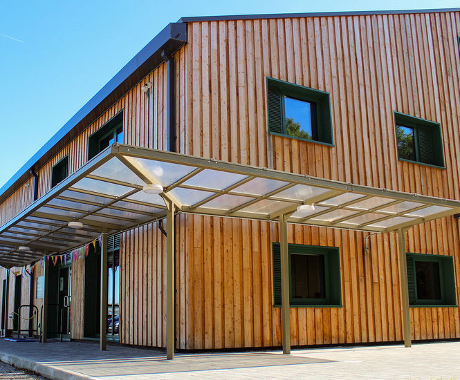 Bespoke wrap-around entrance canopy for new seed processing centre